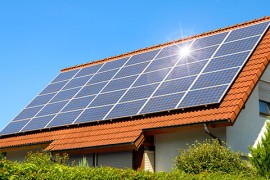 Solar panel on a red roof