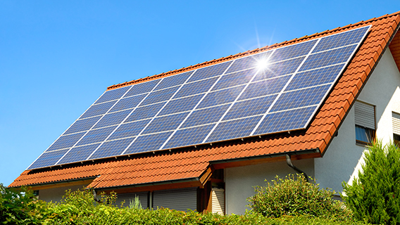 Solar panel on a red roof